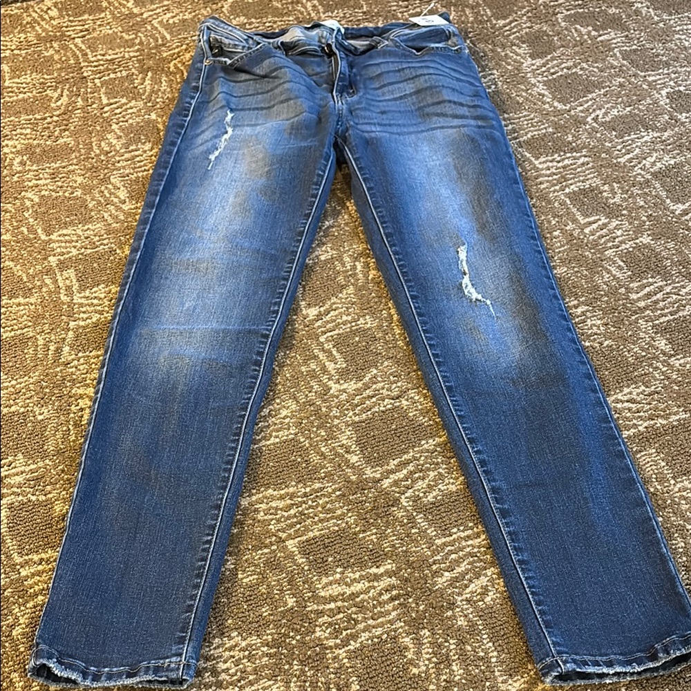 Distressed Blue Denim Jeans